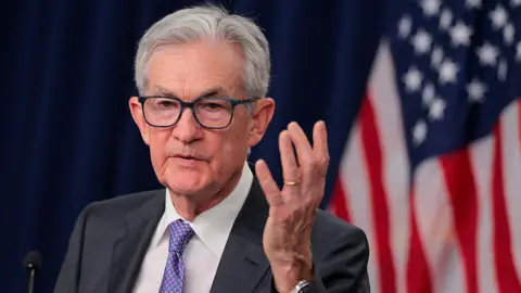 Federal Reserve Chair Jerome Powell speaks during a press conference following the Federal Open Markets Committee meeting at the Federal Reserve on December 10, 2025.