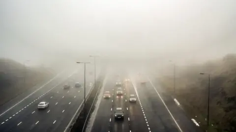 PA Media Foggy conditions on the M62 near Saddleworth Moor. The murky weather has shrouded much of the country over the past few days and shows little sign of abating yet. 