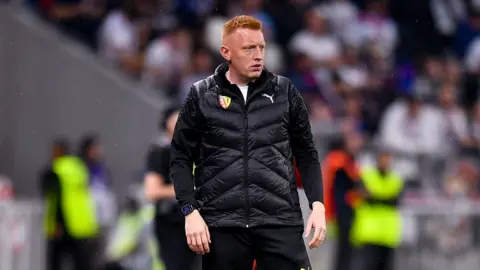 Will Still on the touchline during Lens vs Monaco 