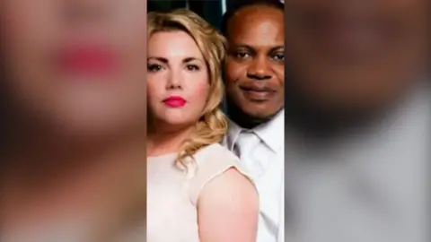 Charmain Speirs and Prophet Eric Adusah dressed in white