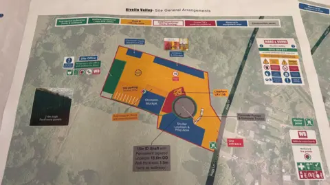 Simon Thake A colourful map showing a production site with different colours and boundaries marked out. 