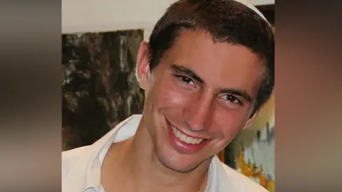 Reuters Hadar Goldin smiles into the camera