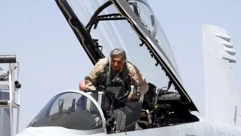 Getty Images Ratan Tata, chairman of the Tata Group, boarded a Boeing F/A-18 Super Hornet fighter jet at Aero India 2011 at Yelahanka Air Base on the outskirts of Bangalore on Thursday.