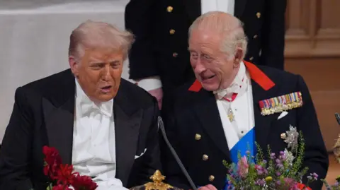 PA Media US President Donald Trump and King Charles III at the state banquet for the US President and First Lady Melania Trump at Windsor Castle, Berkshire, on day one of their second state visit to the UK in September 2025