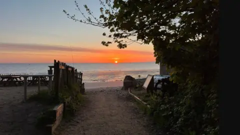BBC Weather Watcher, Lottie Sunrise at Studland, Dorset