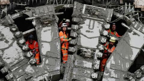 Members of the Tunnel Boring Team look out after digging machine Florence completed HS2's longest tunnel
