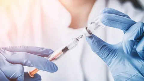 Getty Images Vaccine drawn up into a syringe
