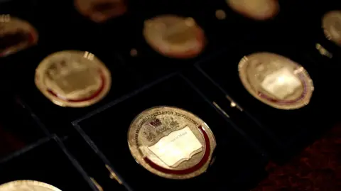 PA Media Queen Elizabeth Prizes for Education medals ahead of the presentation ceremony at St James's Palace in London. The Queen Elizabeth Prizes for Higher and Further Education are part of the UK national honours system, recognising at the highest level of state outstanding work in universities and colleges. Picture date: Tuesday February 24, 2026.