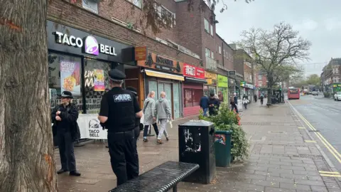 Police officers on Sidwell Street just down the road from the planned premises for Merkur Slots