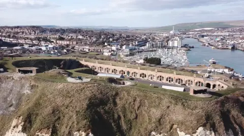 Newhaven Fort An areal view of Newhaven Fort. There is a river in the background and the town.