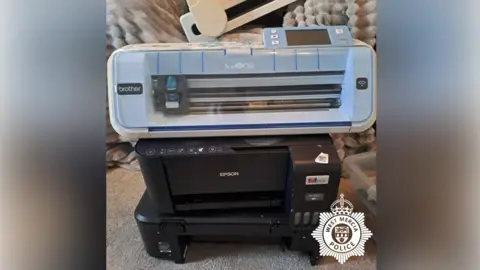 West Midlands Police A close up image of a Epson printer