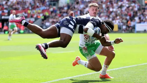 Kalaveti Ravouvou  takes to the air to score Bristol's third try