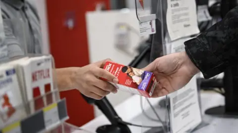 Anadolu purchases medicine by himself through Getty Images on Monday, December 19, 2022 at Walgreens, New York, USA.