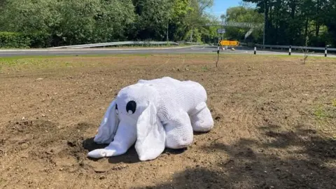 Tony Fisher/BBC A stuffed white elephant on a roundabout 