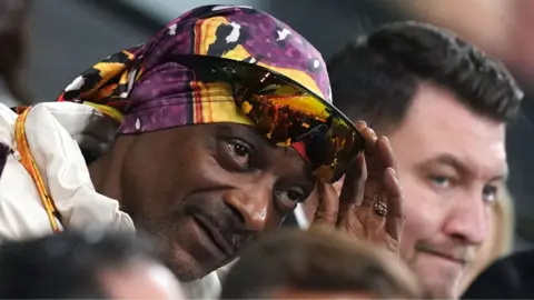 PA Media Swansea City co-owner Snoop Dogg in the stands during the Sky Bet Championship match at the Swansea.com Stadium.