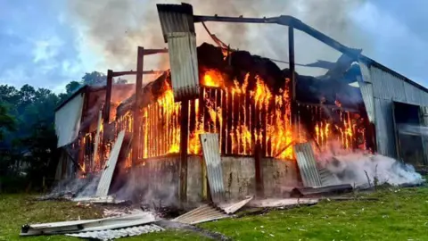 Cornwall Fire and Rescue Service A barn on fire in Cornwall