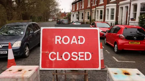BBC A "Road Closed" sign in Jesmond