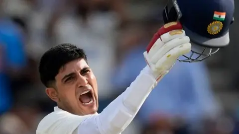 India captain Shubman Gill celebrates hitting a century
