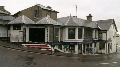 The Bandbox nightclub in Felixstowe pictured around 2000. The building is situated on a bend in the road and has two storeys. 