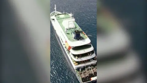 Cruise ship shot from above.