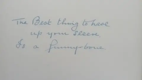 Ateeq Ahmed AN INSCRIPTION INSIDE A BOOK, reading 'The Best thing to have up your sleeve is a funny bone' and is dated to the 7th February 1944. 