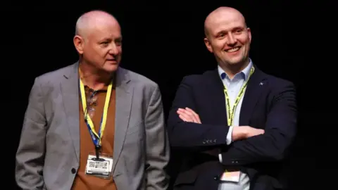 Getty Images Murray Foote, left, pictured with the SNP's Westminster leader Stephen Flynn. The pair are looking off to the side. 