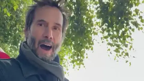 Keanu Reeves was visibly shocked at the speed of the TT riders