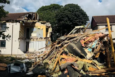 BBC A demolished house in Aberdeen, due to the presence of potentially dangerous concrete.