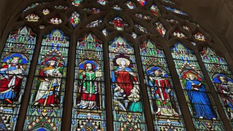 Large stained glass window.