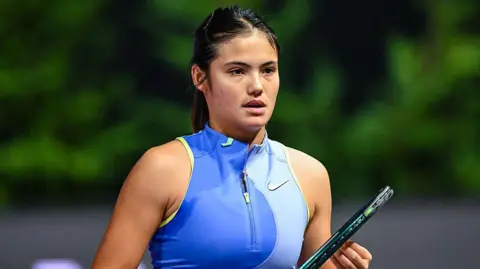 Emma Raducanu looking pensive during a match in early 2026