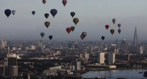Hot air balloons soar above central London as part of the Lord Mayor's Appeal