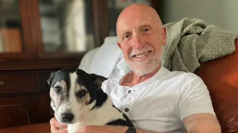 Leicestershire Police David Darke with a dog