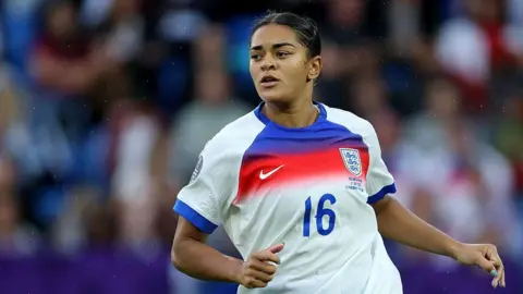 Jess Carter in action for England