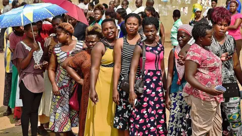 AFP A line of women in Uganda pictured in the capital, Kampala, in 2016