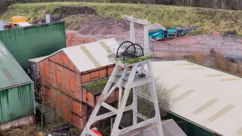 A coal mine headstock viewed from above.