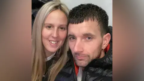Facebook Shannen Morgan and Shane Roller smile for the camera close to each other