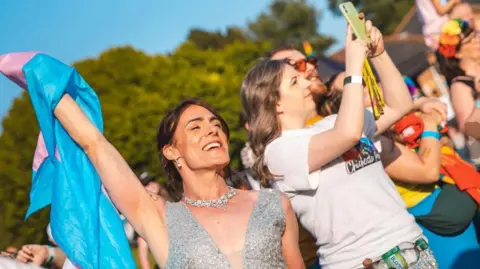 Women celebrate at Chichester Pride in 2023