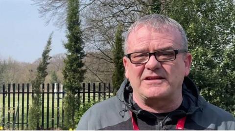 Anti-knife campaigner Alan Walsh looking into the camera