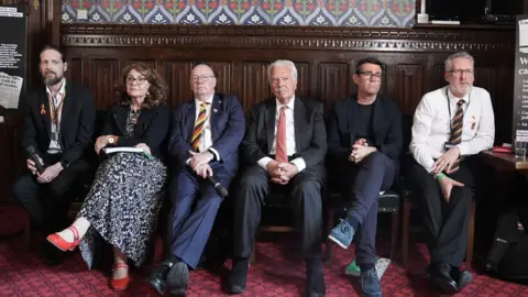 PA Media (Left to right) Andy Evans, Dame Diana Johnson MP, Alistair Burt, former health minister Lord Owen, former health secretary and Mayor of Manchester Andy Burnham and Glenn Wilkinson