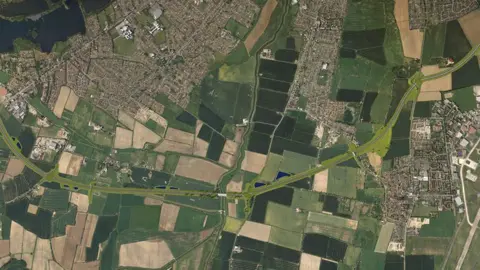 Aerial view of the proposed new road on the south of Lincoln showing it cutting through fields 