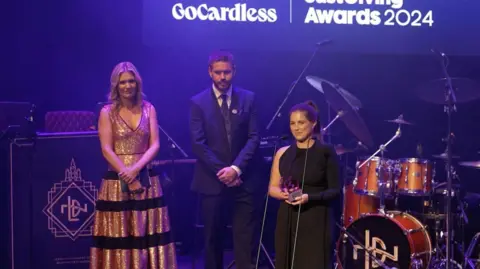 JustGiving Lindsey Burrow at an awards ceremony