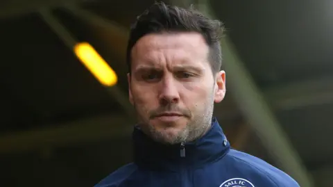 Mat Sadler on the touchline during Walsall's League Two match with Accrington Stanley