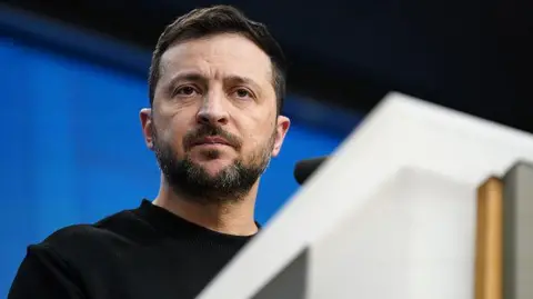 Getty Image shows Volodymyr Zelensky at a press conference during the European Council Meeting on December 19, 2024 in Brussels, Belgium.
