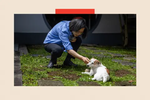 Annabelle Chih Tsai Ing-wen with Le Le, her Jack Russell terrier retired rescue dog