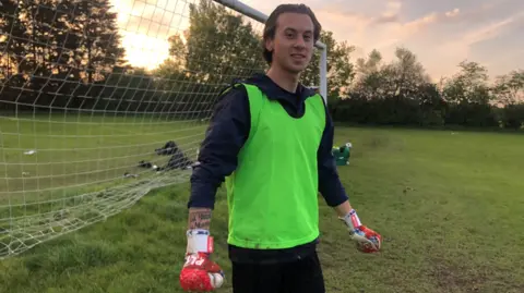 Jonathan Park/BBC Luis Shamshoum stands in goal