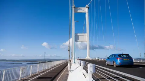 Getty Images A car drives over the old Severn Bridge