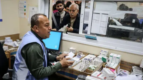 Getty Images A UNRWA employee is providing a Polio vaccine in a clinic in Deir al-Balah, central Gaza Strip, on January 21, 2024