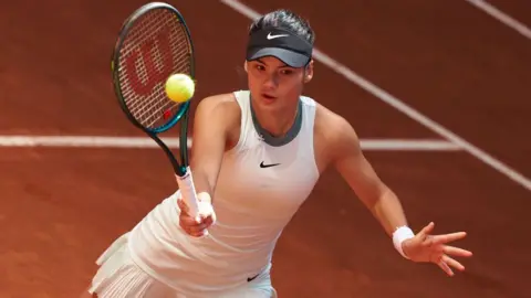 Emma Raducanu plays a forehand at the Madrid Open