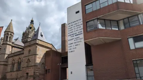 A view of Chester Town Hall on the left with the more modern buildings on the right