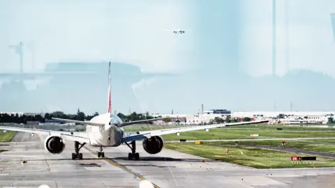 Passenger jets at Montréal-Pierre Elliott Trudeau International Airport